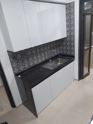 Kitchen in 2 BHK Apartment at Atmiya Centria, Santacruz East – for Rent