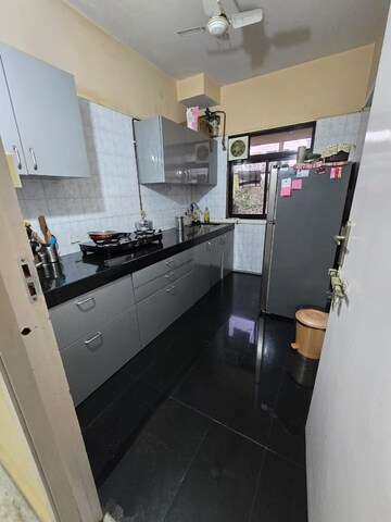 Kitchen in 3 BHK Apartment at Patel Terrace, Andheri East – for Sale