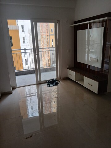Living Room in 2 BHK Apartment at Supertech Czar Suites, Omicron I Greater Noida – for Rent