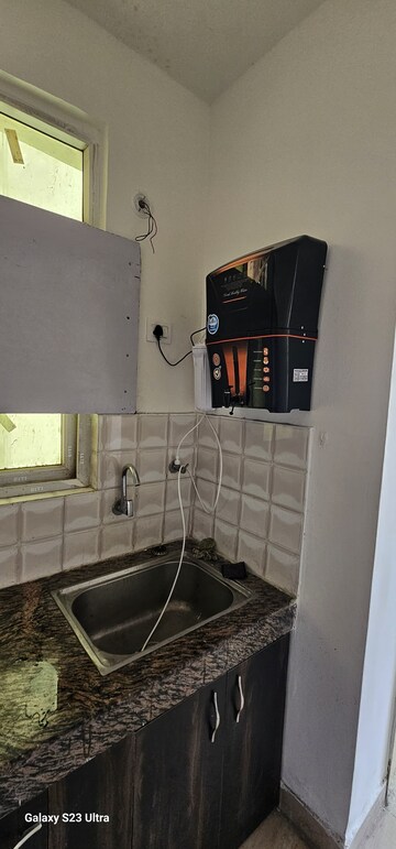 Kitchen in 2 BHK Apartment at Supertech Czar Suites, Omicron I Greater Noida – for Rent