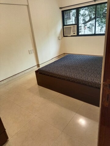 Bedroom in 2 BHK Apartment at Manju Mahal Apartment, Pali Hill – for Rent