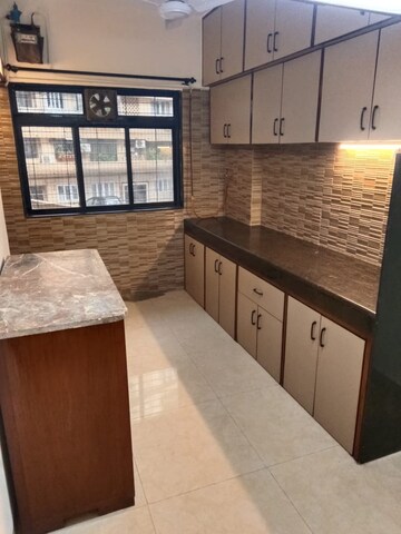 Kitchen in 2 BHK Apartment at Manju Mahal Apartment, Pali Hill – for Rent