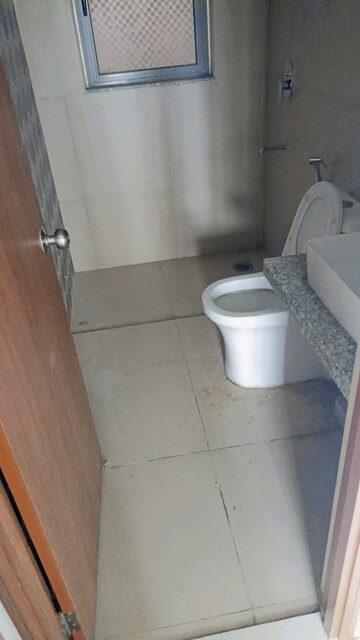 Bathroom in 2 BHK Apartment at Kalpataru Immensa, Kolshet Road – for Rent