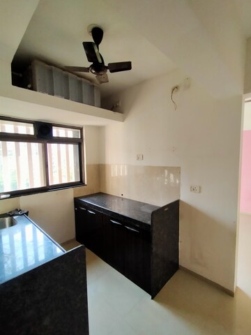 Kitchen in 1.5 BHK Apartment at Rustomjee Avenue D1, Virar West – for Rent