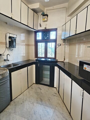 Kitchen in 2 BHK Apartment at Seema Apartment Bandra, Bandra West – for Rent
