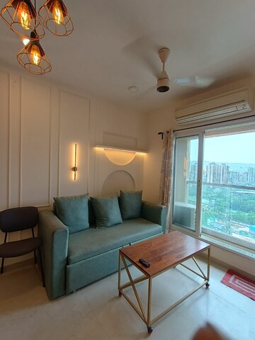 Living Room in 2 BHK Apartment at Dosti West County, Balkum Pada – for Rent