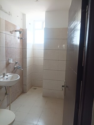 Bathroom in 3 BHK Apartment at Green Valley Heights, Dhakoli – for Sale