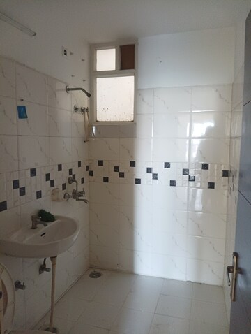 Bathroom in 3 BHK Apartment at Green Valley Heights, Dhakoli – for Sale