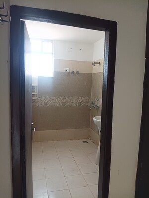 Bathroom in 3 BHK Apartment at Green Valley Heights, Dhakoli – for Sale