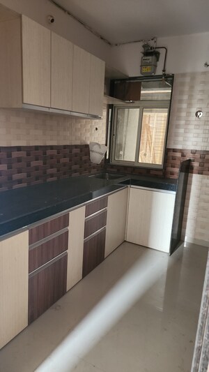 Kitchen in 2.5 BHK Apartment at Jangid Galaxy, Ghodbunder Road – for Sale