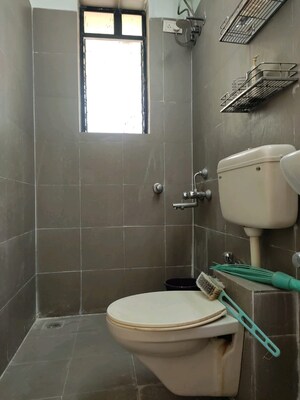 Bathroom in 3 BHK Apartment at Progressive Cottage, Kopar Khairane – for Sale