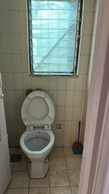 Bathroom in 1 BHK Apartment at Khar West – for Rent