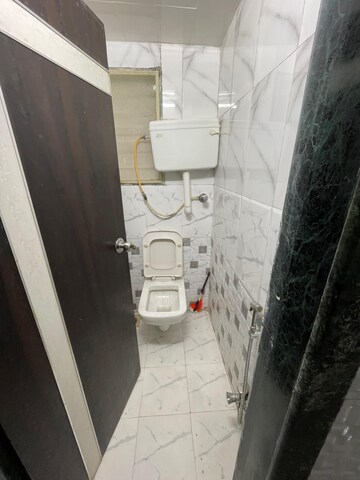 Bathroom in 2 BHK Apartment at RNA NG Paradise, Mira Road – for Sale