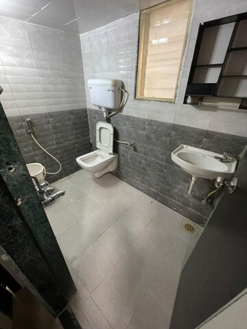 Bathroom in 2 BHK Apartment at RNA NG Paradise, Mira Road – for Sale
