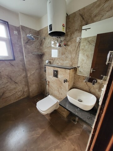 Bathroom in 2.5 BHK Apartment at ROF Ananda, Sector 95 – for Rent