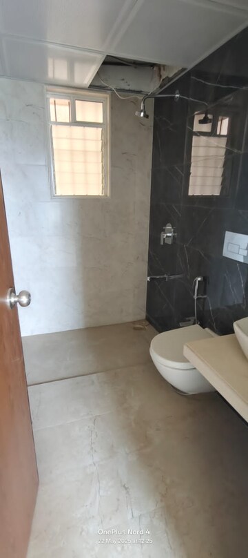 Bathroom in 2 BHK Apartment at Dosti West County, Balkum Pada – for Rent