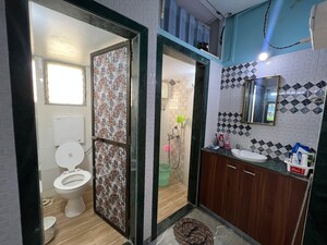 Bedroom in 1 BHK Apartment at Nagari Niwara CHS, Goregaon East – for Sale