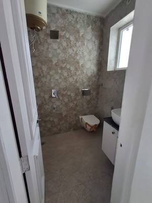 Bathroom in 3 BHK Builder Floor at Sahastradhara Road – for Sale