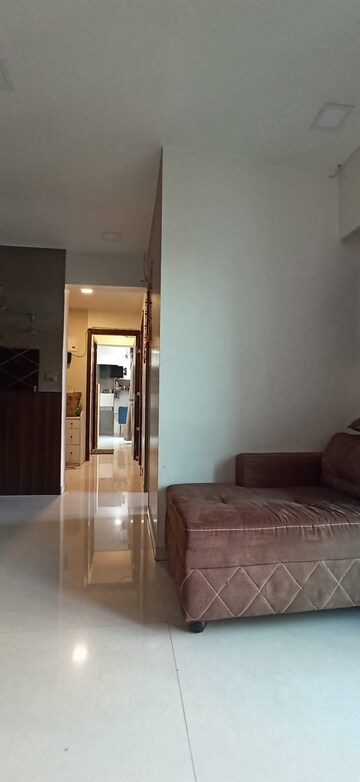Living Room in 2 BHK Apartment at Nexus Hyde Park Residency, Manpada – for Rent