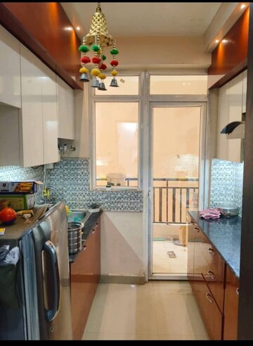 Kitchen in 3 BHK Apartment at Amrapali Crystal Homes, Sector 76 – for Rent