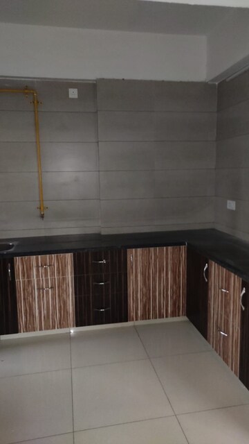 Kitchen in 3 BHK Apartment at Shree Balaji Agora Residency, Sughad – for Rent