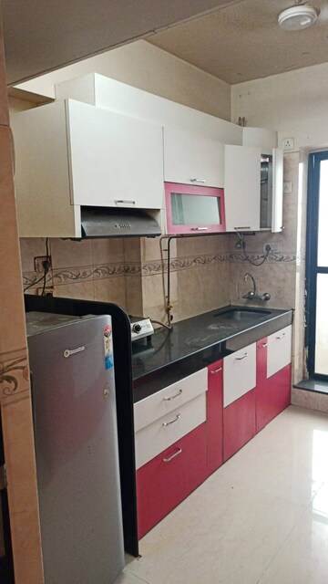 Kitchen in 2 BHK Apartment at K Raheja Heights, Malad East – for Rent