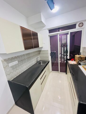 Kitchen in 2 BHK Apartment at Lodha Codename Premier, Dombivli East – for Rent