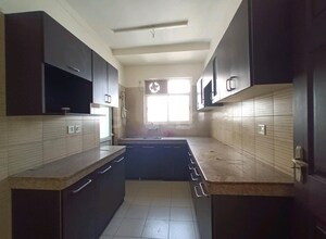 Kitchen in 3 BHK Apartment at 3C Lotus Boulevard, Sector 100 – for Sale