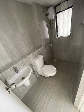 Bathroom in 1 BHK Apartment at Runwal Gardens Phase 2, Dombivli East – for Rent