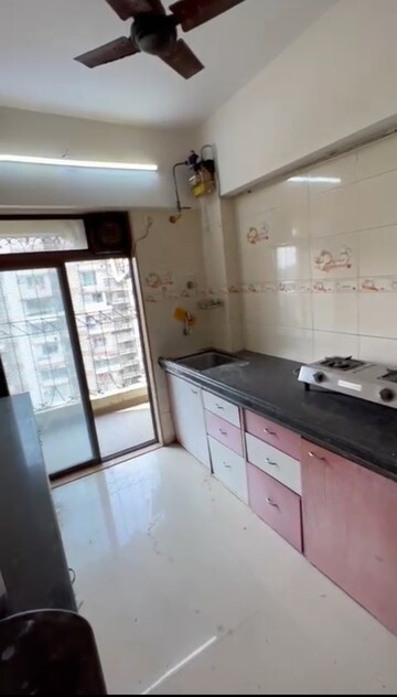 Kitchen in 2 BHK Apartment at Milan Alpine, Andheri West – for Rent