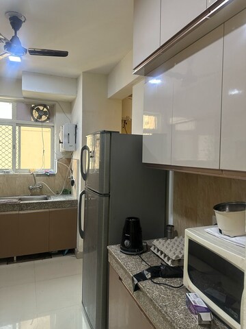 Kitchen in 2 BHK Apartment at Nimbus The Hyde park, Sector 78 – for Rent