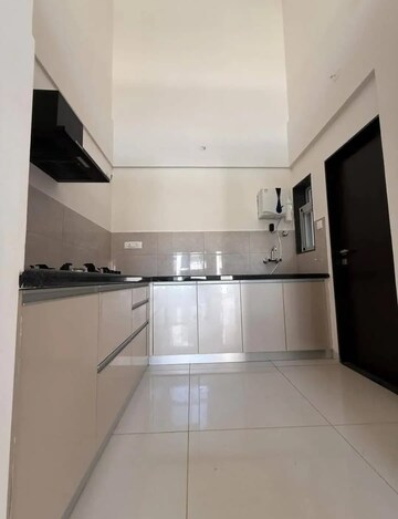 Kitchen in Studio Apartment at Gera World of Joy, Kharadi – for Rent