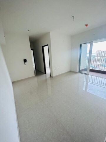 Living Room in 2 BHK Apartment at Lodha Amara, Kolshet Road – for Sale