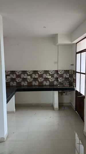 Kitchen in 2 BHK Apartment at Signature Global Synera, Sector 81 – for Sale