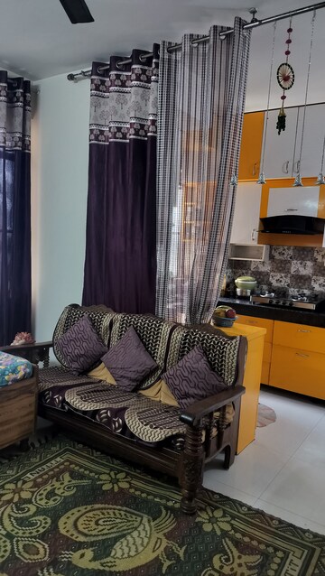 Living Room in 1 BHK Apartment at Signature Global Synera, Sector 81 – for Sale