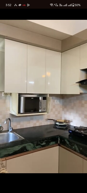 Kitchen in 1 BHK Apartment at ROF Ananda, Sector 95 – for Sale