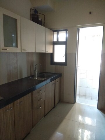 Kitchen in 2 BHK Apartment at Cosmic Heights, Wadala – for Sale