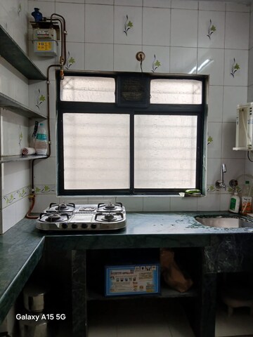 Kitchen in 2 BHK Apartment at Sai Nagar CHS, Kalamboli – for Rent