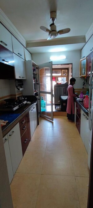 Kitchen in 4 BHK Apartment at Dheeraj Gaurav Heights, Jogeshwari West – for Sale