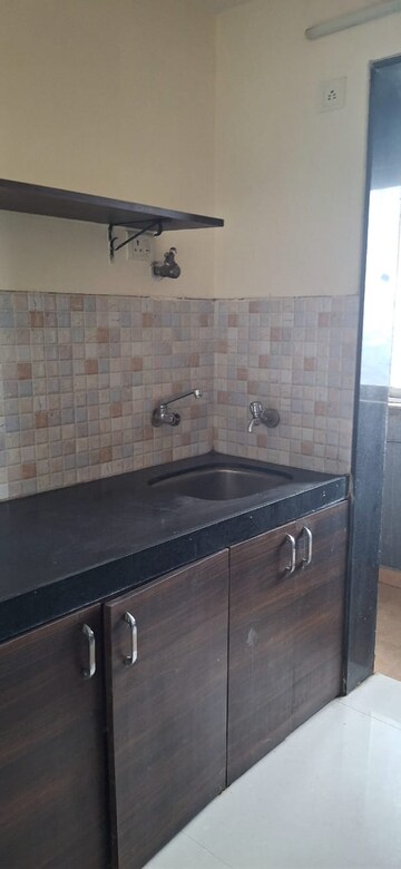 Kitchen in 1 BHK Apartment at Lotus Lotus Link Square, Malad West – for Rent