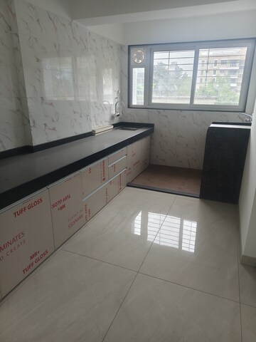 Kitchen in 2 BHK Apartment at D And T Rajkamal Park CHS, Aundh – for Rent