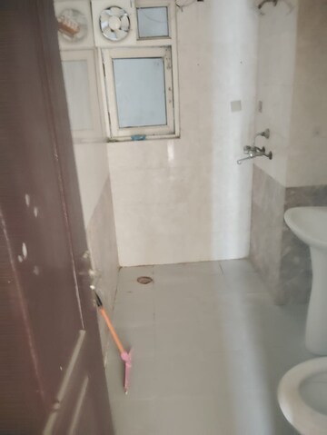 Bathroom in 3 BHK Apartment at Aims Golf City, Sector 75 – for Rent