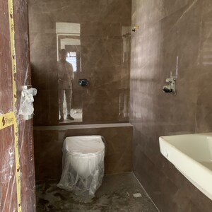 Bathroom in 2 BHK Apartment at Goyal Abhiram, Kastur Park – for Sale