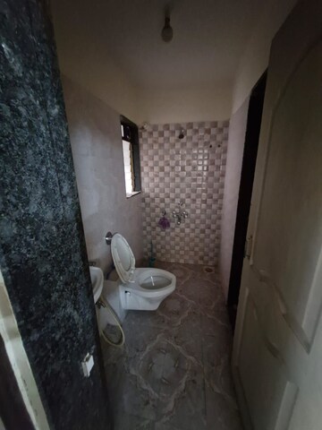 Bathroom in 2 BHK Apartment at Crystal Garden Estate CHS, Manpada – for Rent