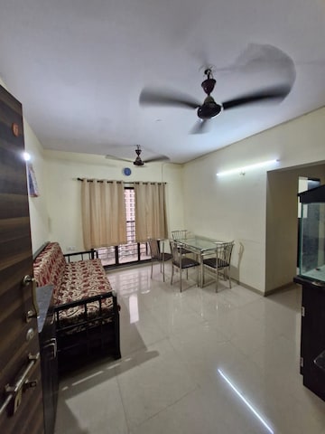 Living Room in 2 BHK Apartment at Crystal Garden Estate CHS, Manpada – for Rent