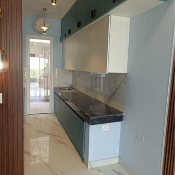 Kitchen in 2.5 BHK Apartment at Smart World Gems, Sector 89 – for Rent
