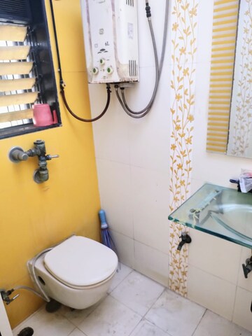 Bathroom in 2 BHK Apartment at Sumeru CHS, Andheri West – for Rent