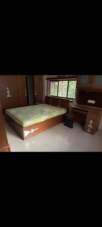 Bedroom in 3.5 BHK Apartment at Samarth Ashish CHS, Andheri West – for Rent
