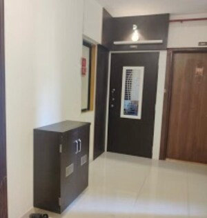 Living Room in 1 BHK Apartment at Raunak Heights, Ghodbunder Road – for Sale