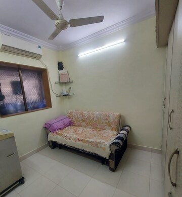 Living Room in 1 BHK Apartment at Ajit Nagar CHS, Andheri East – for Rent